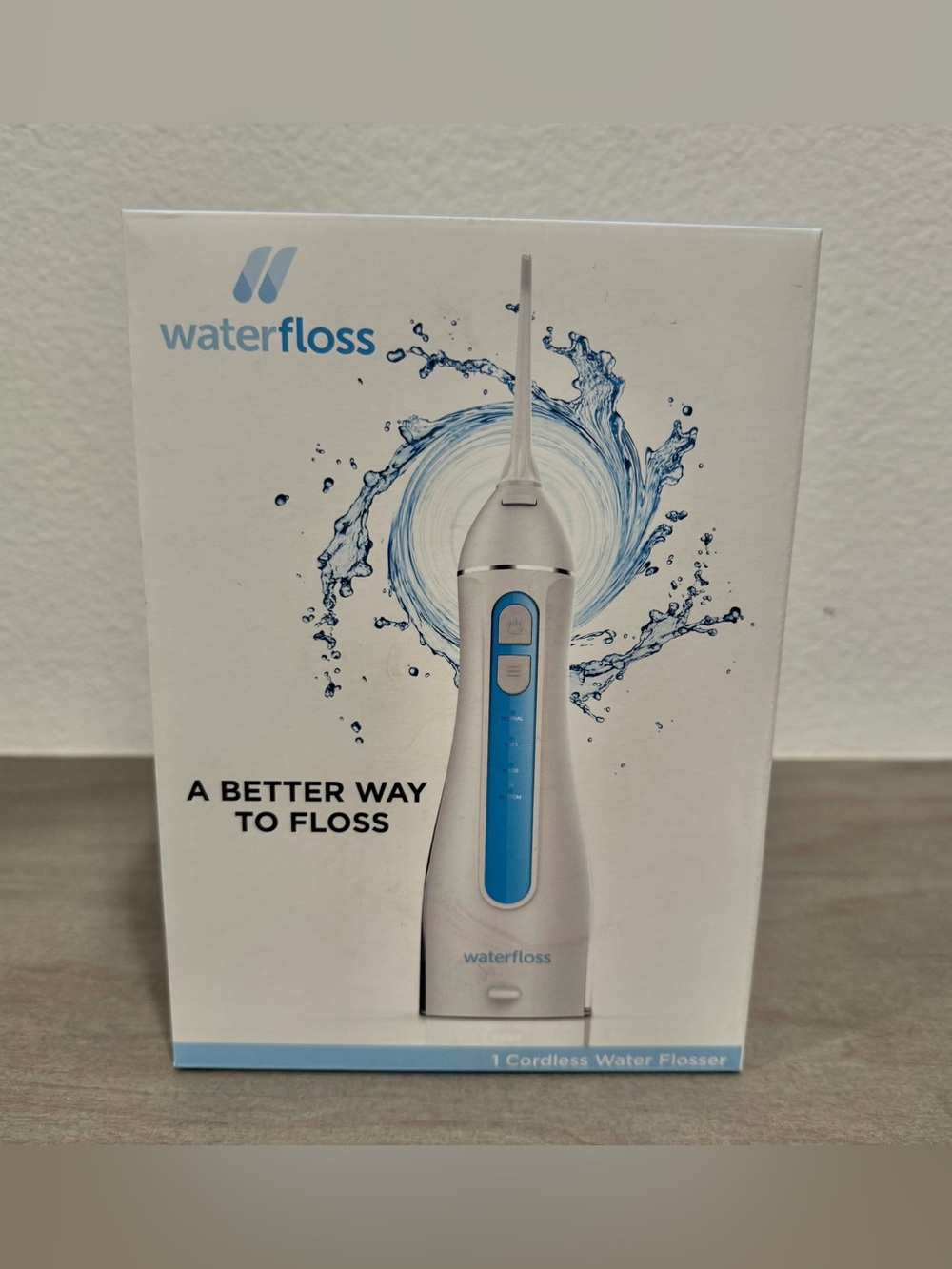 Waterfloss Cordless Water Flosser in White and Blue